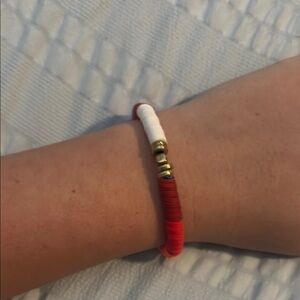 Red and White Jewelry Bracelet with Gold Accents